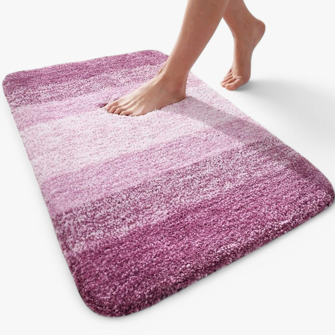UltraAbsorbent non-slip bathroom mat in soft grey, offering comfort and safety.
