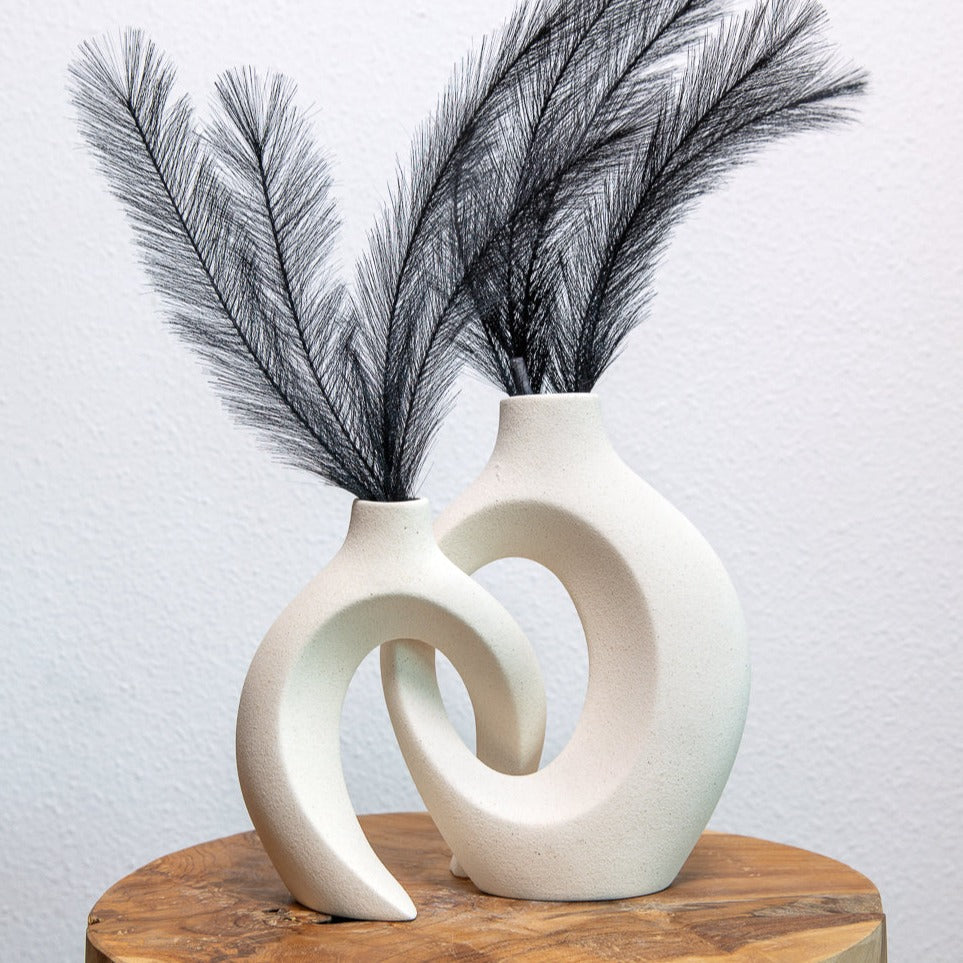 Elegant decorative ceramic vase with woven pattern, ideal for contemporary home accents.