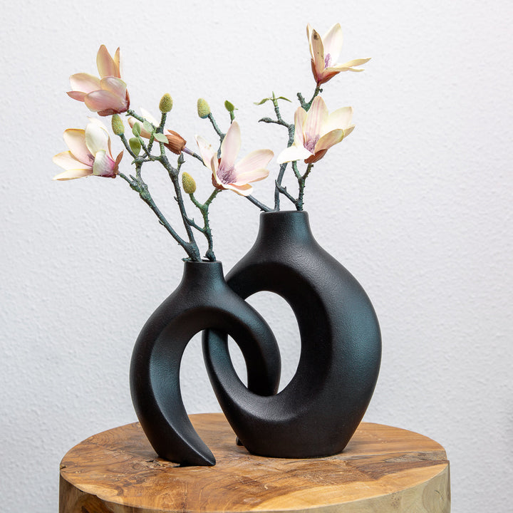 Modern ceramic vase with intricate woven design, a statement piece for any room decor.