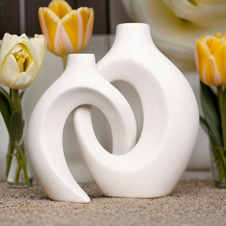 Textured ceramic vase with a unique woven pattern, ideal for displaying fresh flowers.