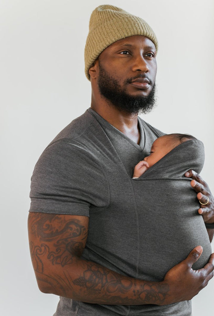Versatile baby carrier T-shirt, an essential piece of baby gear for new parents seeking comfort.