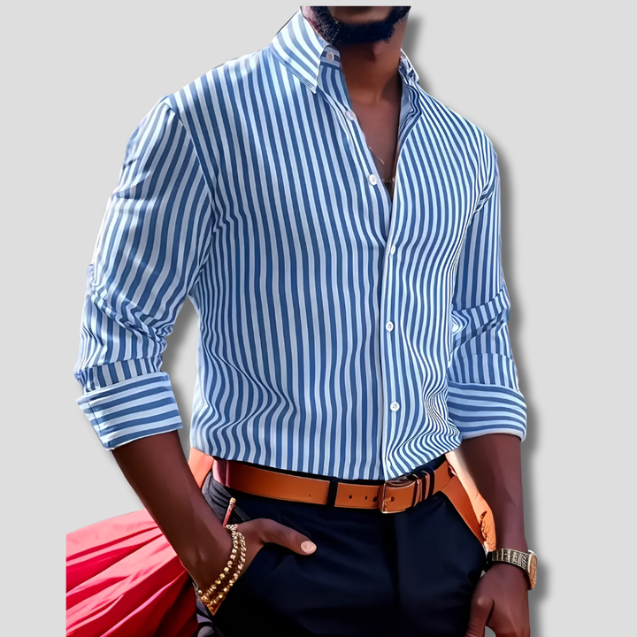 Classic striped button-up shirt for unisex fashion. Features long sleeves & collar, ideal for casual or formal styling.