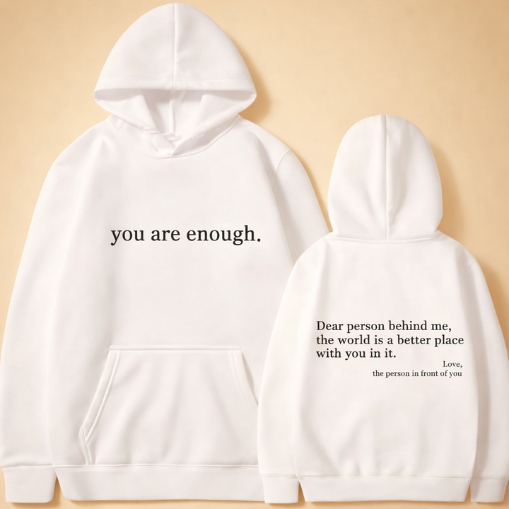 Soft knit unisex hoodie featuring an adjustable drawstring hood and front kangaroo pocket. Ideal loungewear.