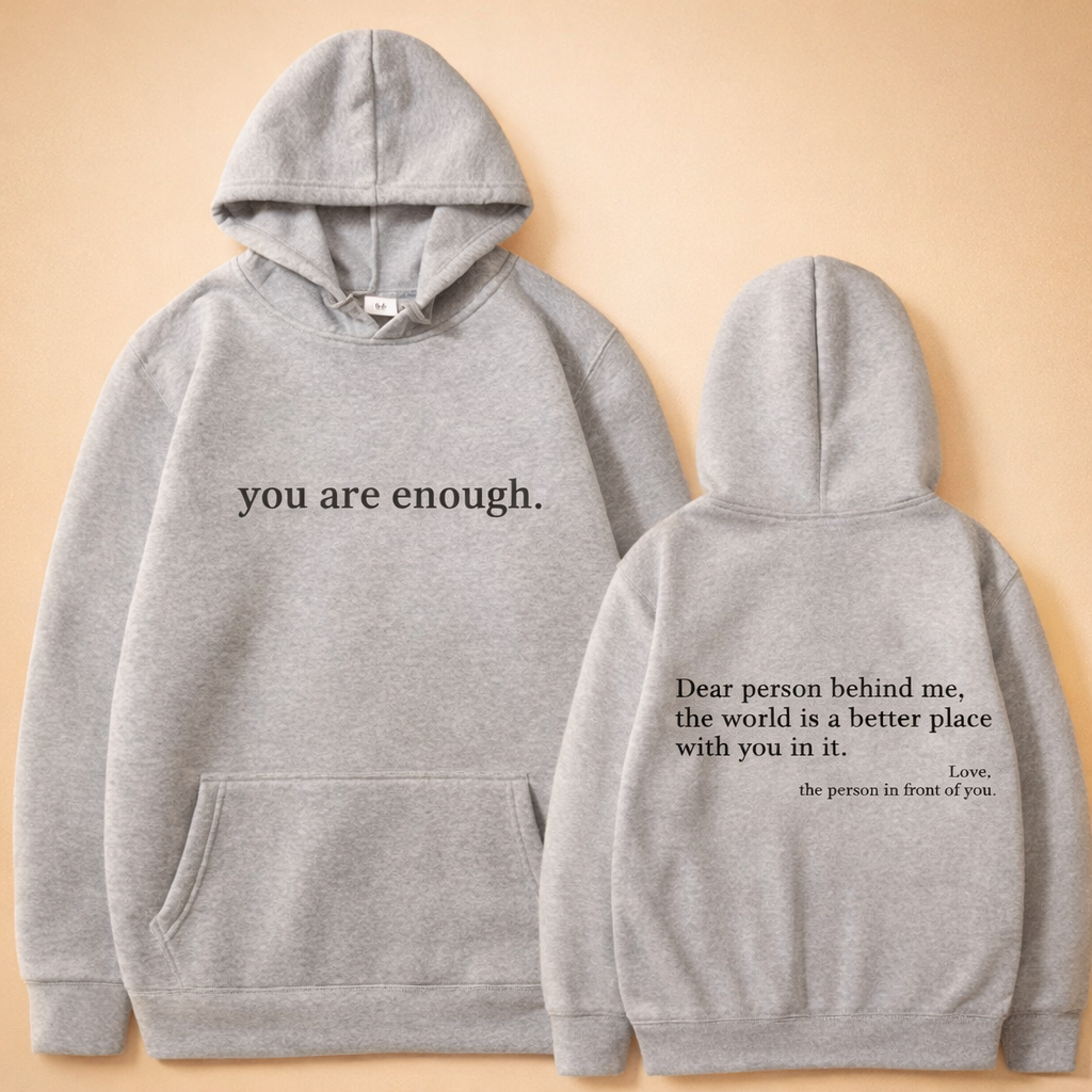 Casual grey unisex hoodie with drawstring hood and practical kangaroo pocket. Essential everyday comfort wear.
