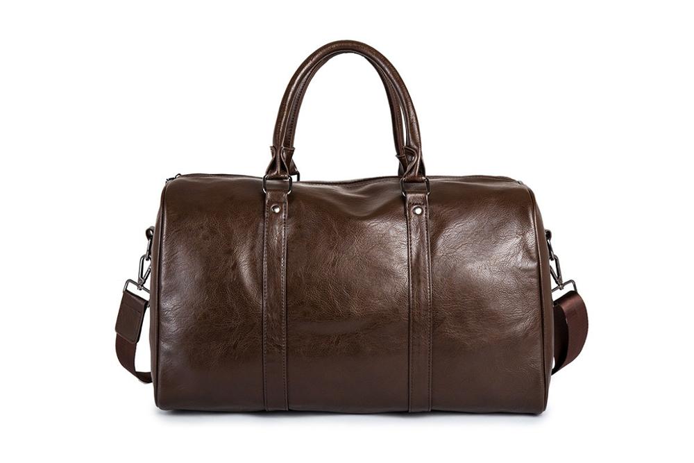 Unisex durable leather carry-on duffel bag, ideal for weekend trips, business travel, and overnight stays.