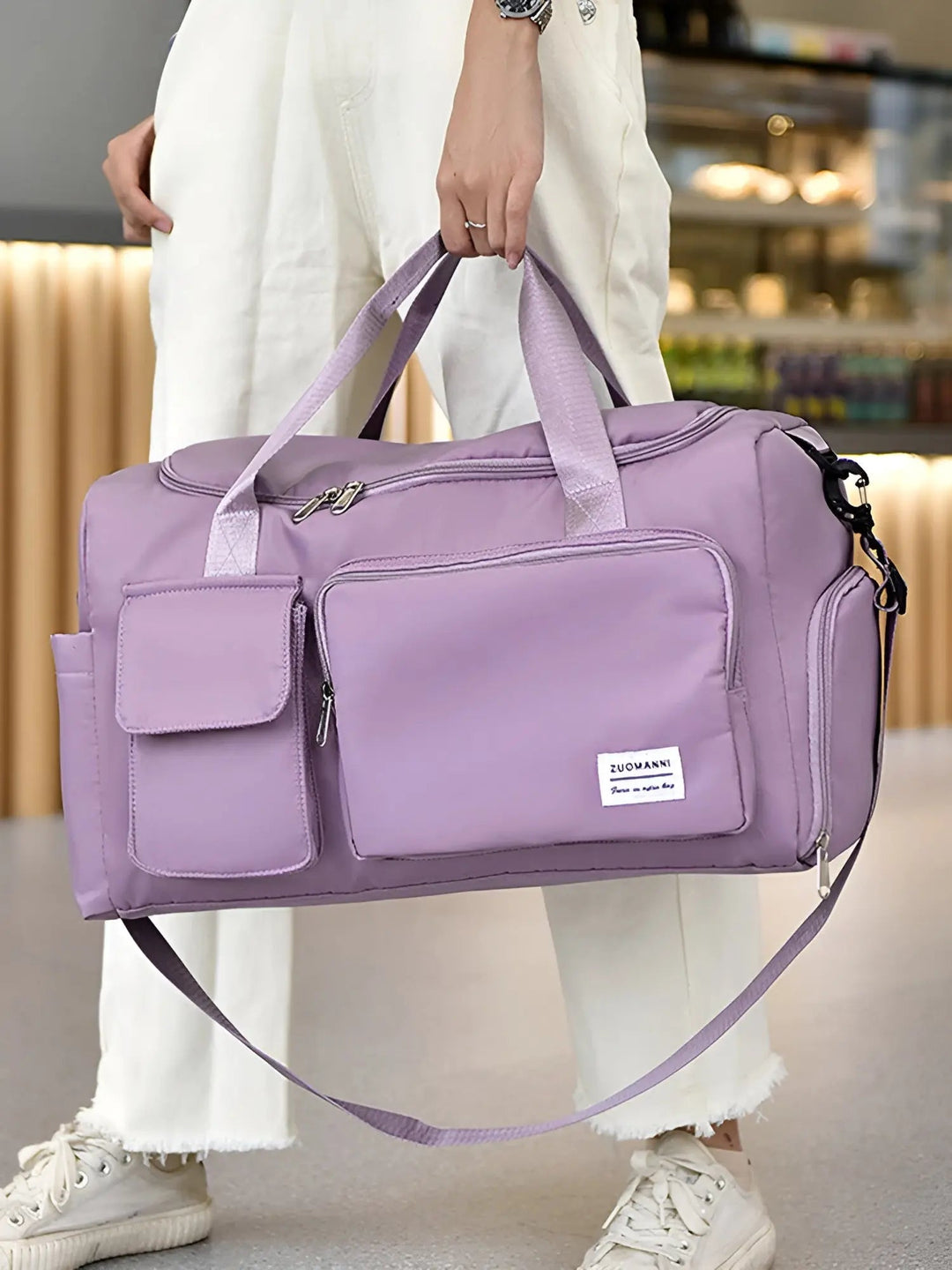 Unisex extra-large waterproof travel duffel bag for gym & weekend trips.