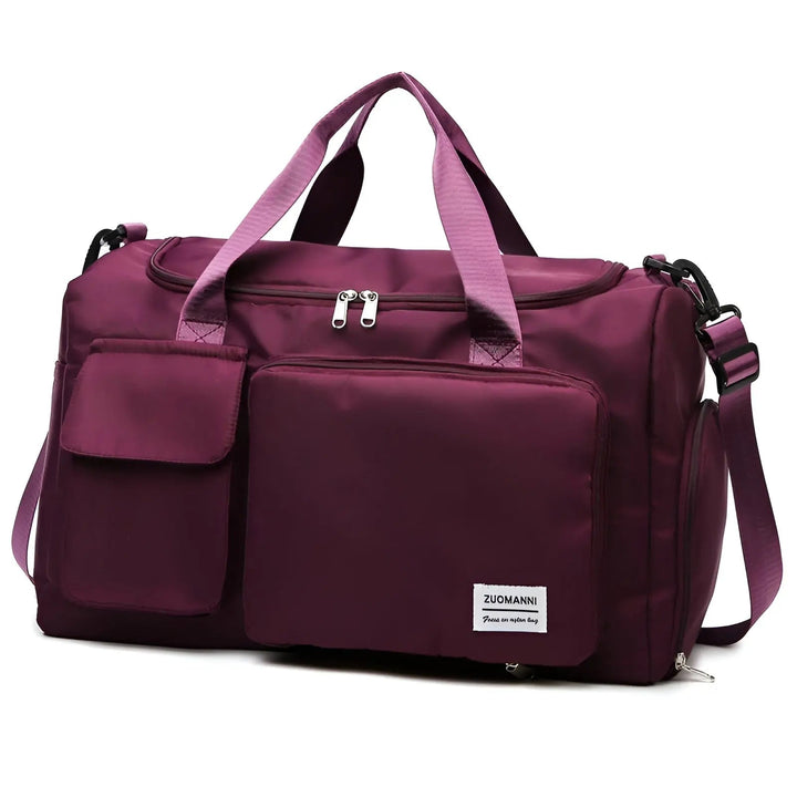 Black unisex waterproof duffel bag, excellent for travel, gym, or weekend adventures.