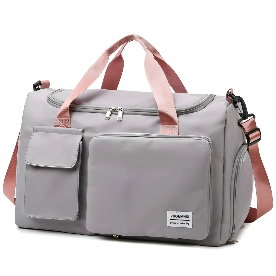 Heavy-duty waterproof duffel bag for travel & gym, designed for long-lasting use.