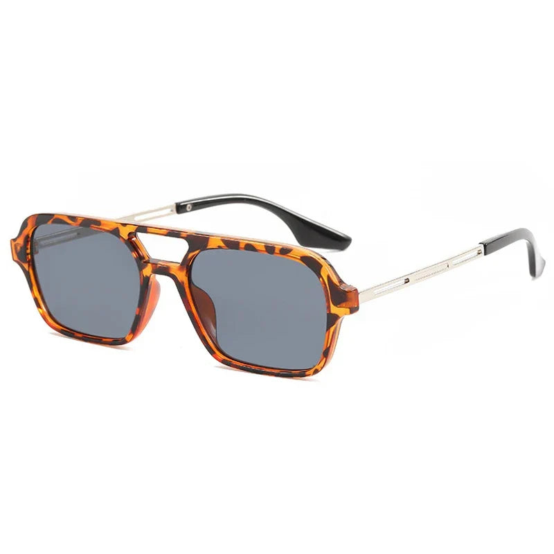 Close-up of unisex fashion sunglasses, highlighting durable frame and UV protective lenses.