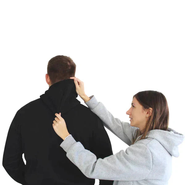 Model wearing a ThermaHoodie unisex heated hoodie for winter outdoor activities.