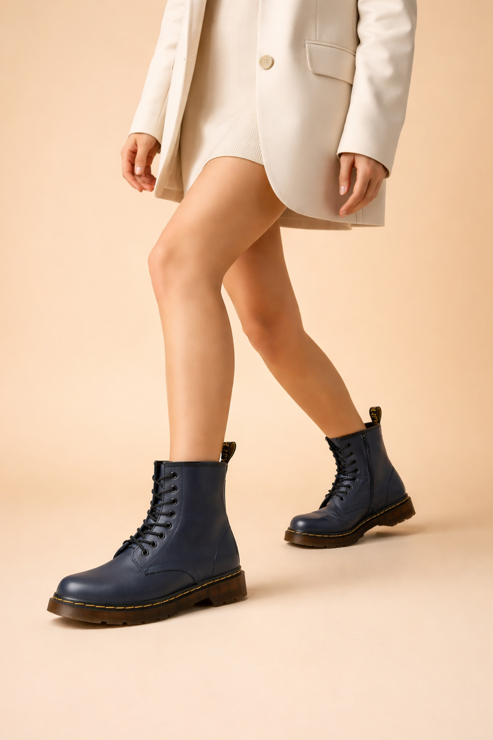 Comfortable, durable unisex winter boots with secure lace-up closure. Insulated ankle design for cold.