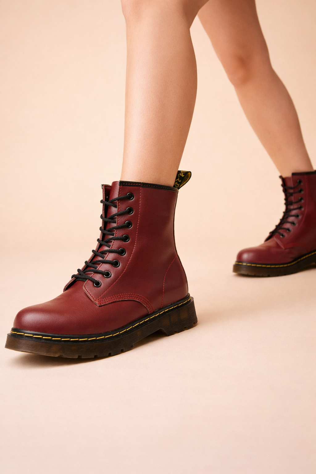 Unisex insulated ankle boots providing warmth & comfort. Perfect lace-up winter footwear for men & women.