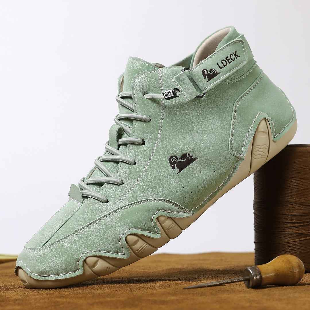 Durable unisex leather hiking shoes designed for outdoor adventures.