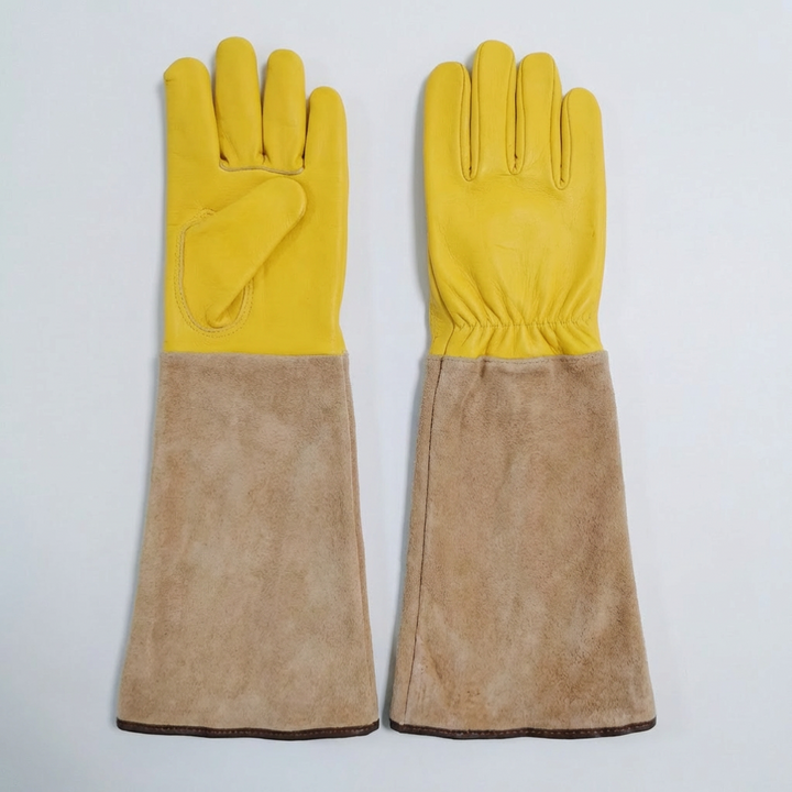 Unisex long gardening gloves with forearm protection for planting, weeding, and thorny bushes. Durable garden work.
