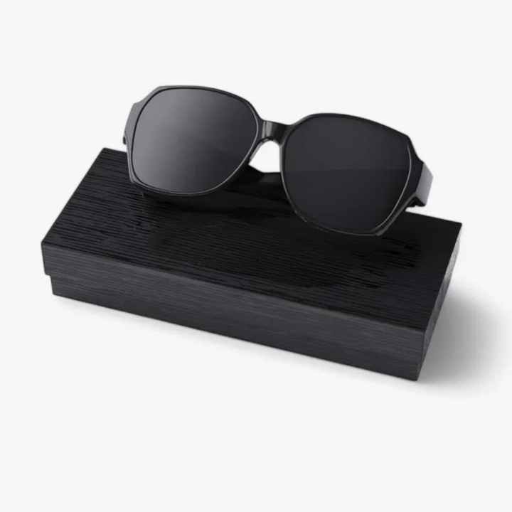 Black unisex over-glasses polarized sunglasses providing excellent eye protection & glare reduction.