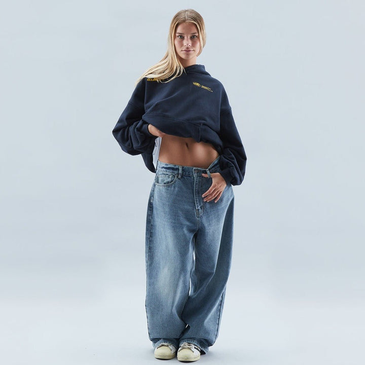 Soft & comfortable women's oversized graphic hoodie for casual fashion, perfect for layering.
