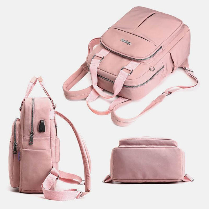 Heavy-duty waterproof unisex backpack, with USB, ideal as a travel & school bag, made for durability.