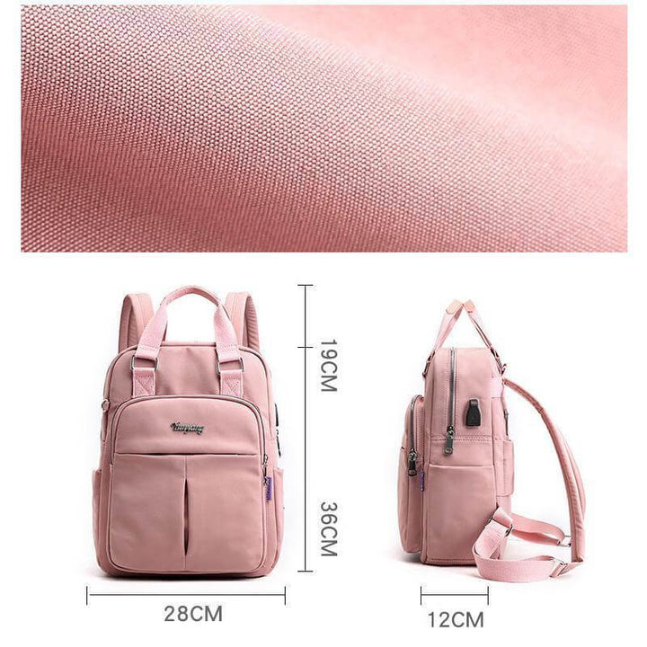 Spacious waterproof laptop bag, unisex, multifunctional, with USB port for modern travelers.