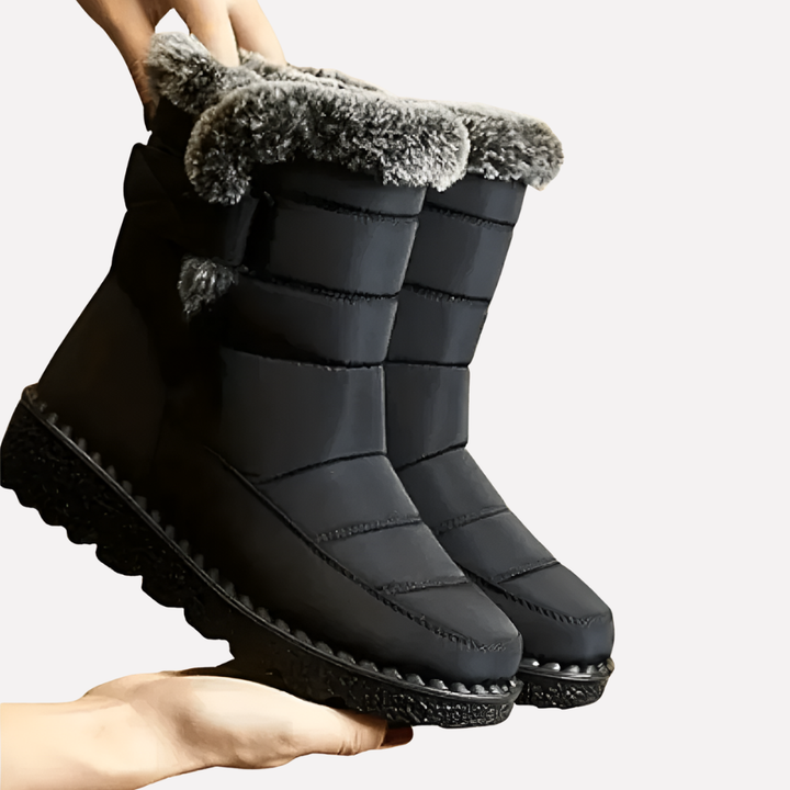 Stay warm & dry with unisex winter snow boots, perfect for outdoor activities & cold weather. Features non-slip sole.