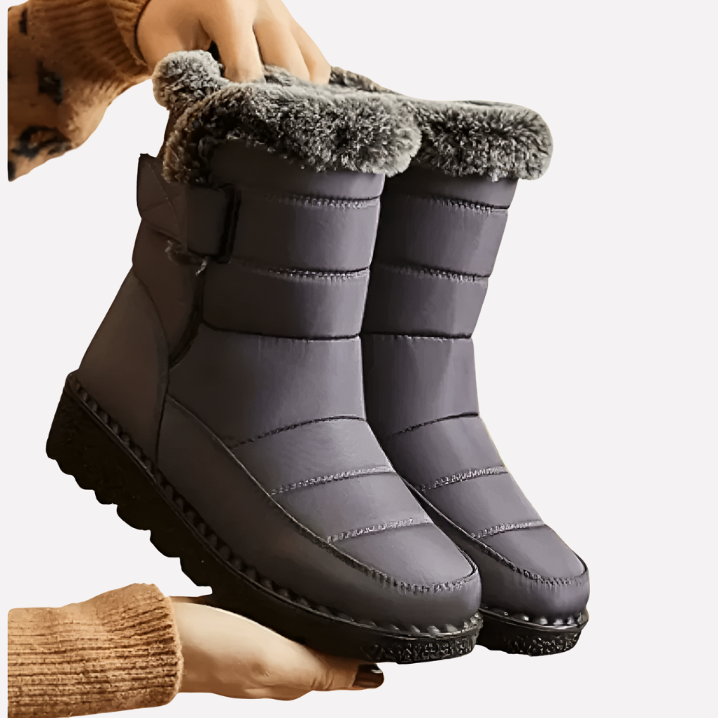 Durable unisex waterproof snow boots with a warm lining & non-slip sole, essential for winter outdoor adventures.
