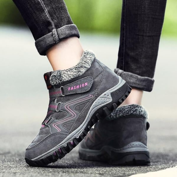 All-weather Aspen Winter Boots, waterproof for men & women, keeping feet warm and stable.