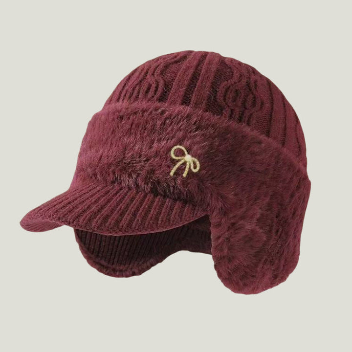 Lightweight yet warm unisex winter cap with cozy ear flaps.