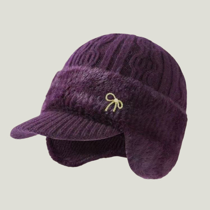 Explore the outdoors comfortably in this fleece-lined ear flap beanie.
