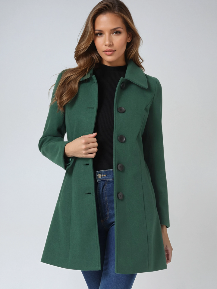 Chic single-breasted trench coat for women. Classic, tailored long jacket, perfect elegant outerwear for cold weather.