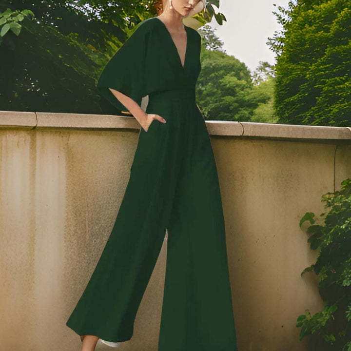 Stylish V-neck jumpsuit for women, three-quarter sleeves, offering comfort and a modern, chic look.