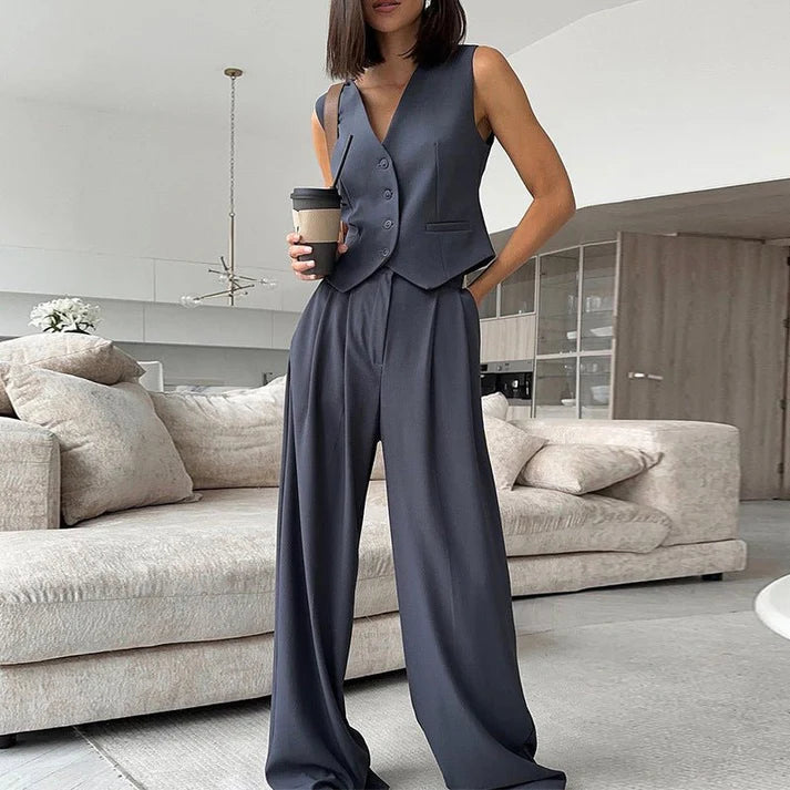 Sleek women's tailored sleeveless vest and matching wide-leg pants set, ideal for business.