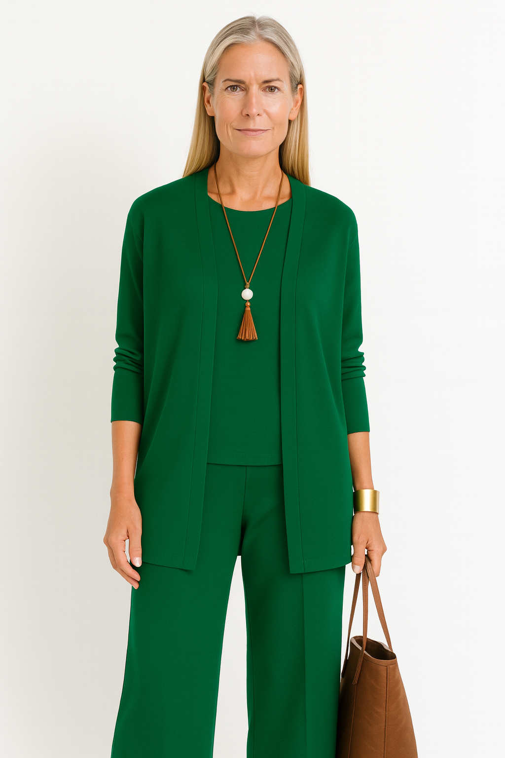 Relaxed women's casual set for everyday wear: open front cardigan, tank top, & wide leg trousers.