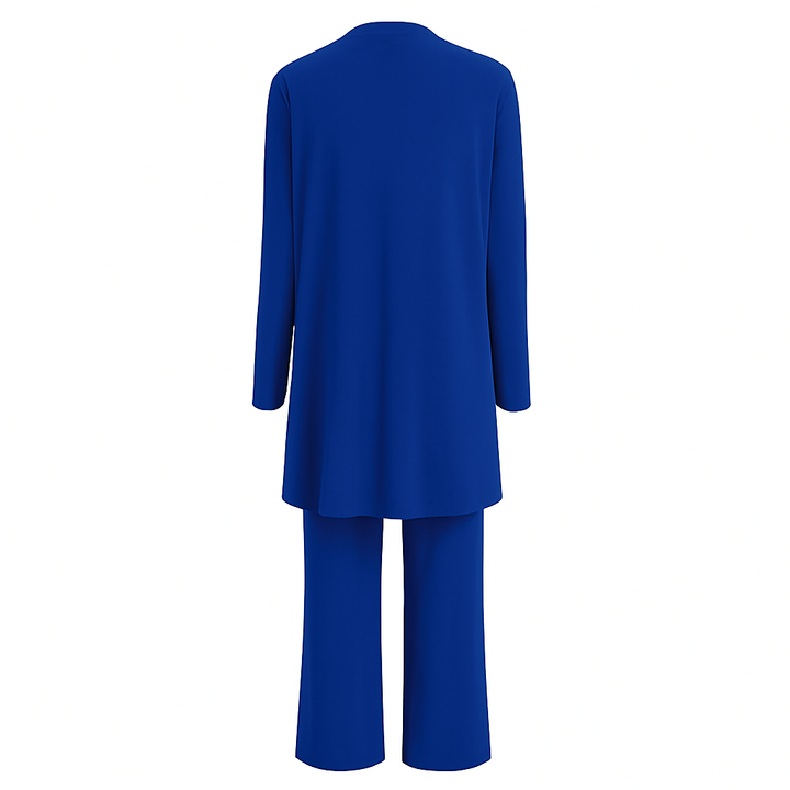 Modern women's layered fashion: open front cardigan, simple tank, & elegant wide leg trousers set.