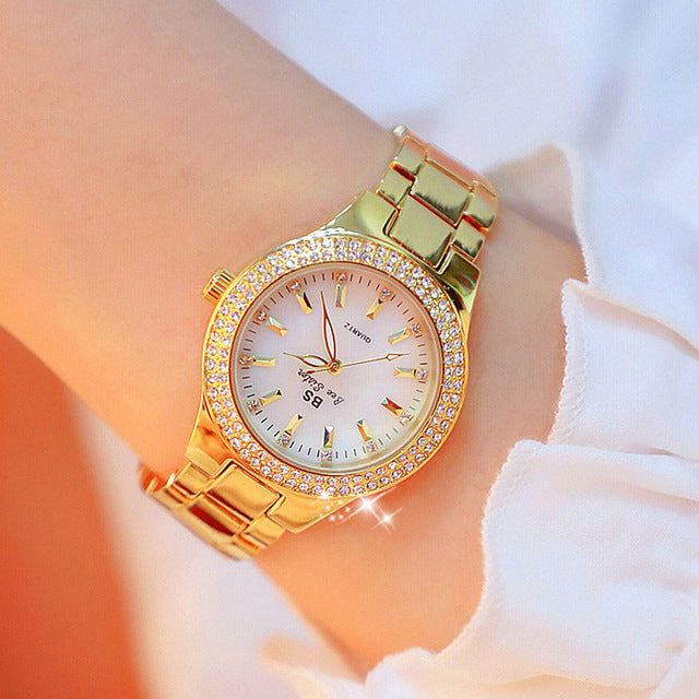 Stylish women's silver stainless steel quartz watch with water resistant round dial, a chic timepiece for any occasion.