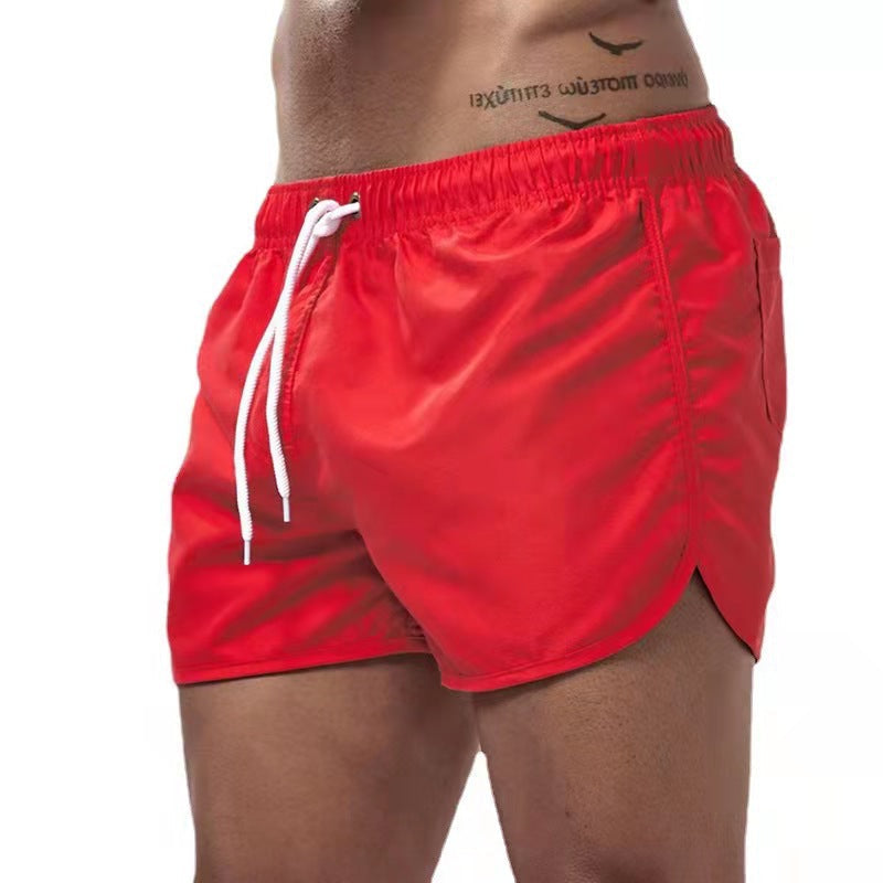 Stylish men's quick-dry surf shorts for active beachwear. Comfortable fit with pockets.