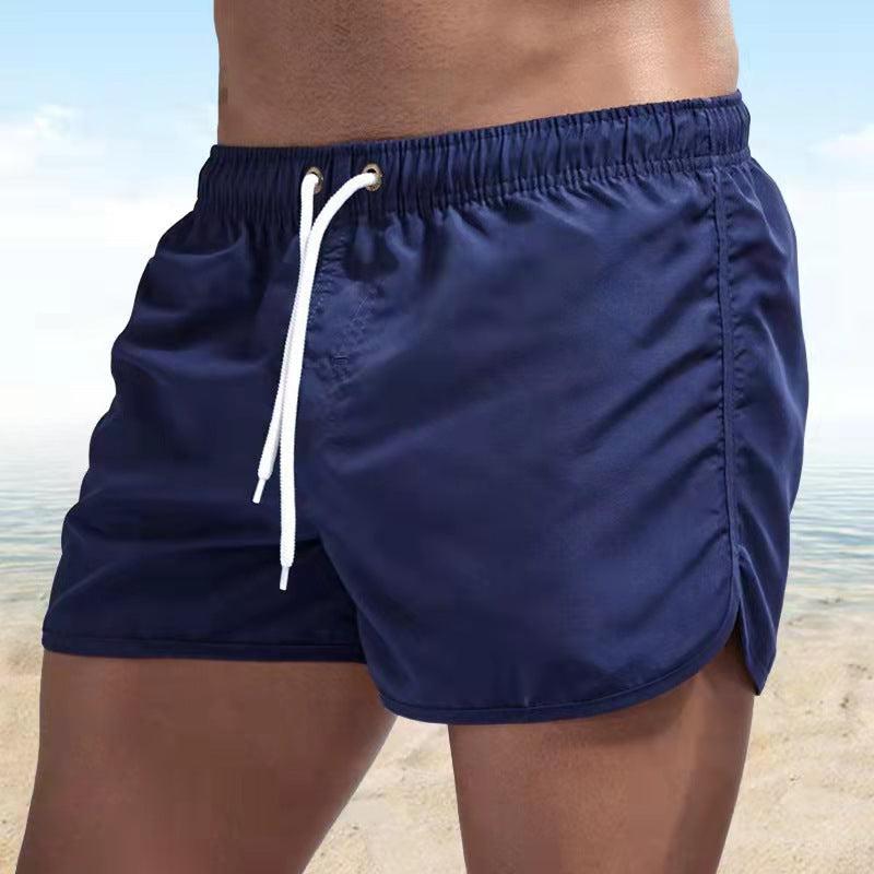 Men's wave swim shorts, fast-dry fabric, comfortable elastic waist, and practical pockets.