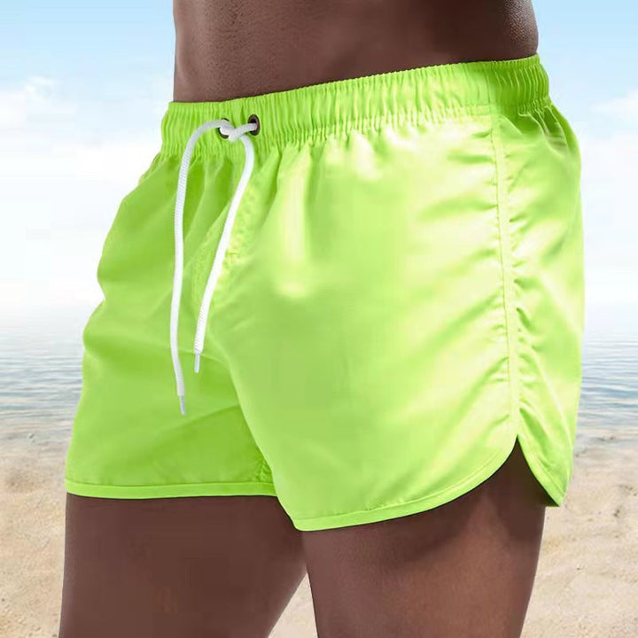 Ultimate comfort men's quick-dry swim shorts. Stylish design, pockets, perfect for beach & surf.