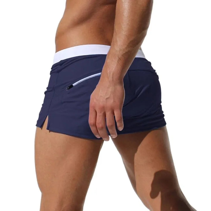 Men's quick-dry swim shorts, ideal for beach & poolside. Features a secure zip pocket.