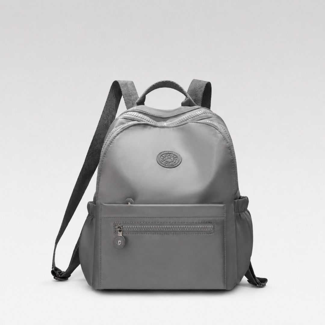 Small nylon mini backpack, compact everyday carry solution for essentials. Lightweight & versatile.