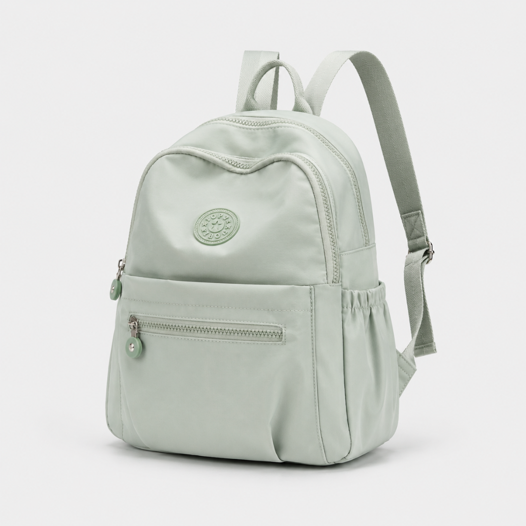 Sleek compact nylon mini backpack, practical for daily essentials. A modern casual bag.