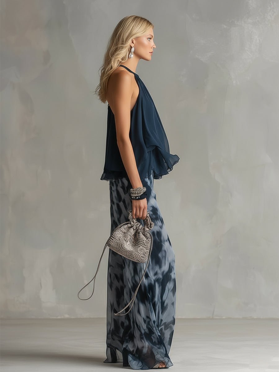 Comfortable navy blue two-piece set: halter neck top and flowy wide leg pants for summer outfits.