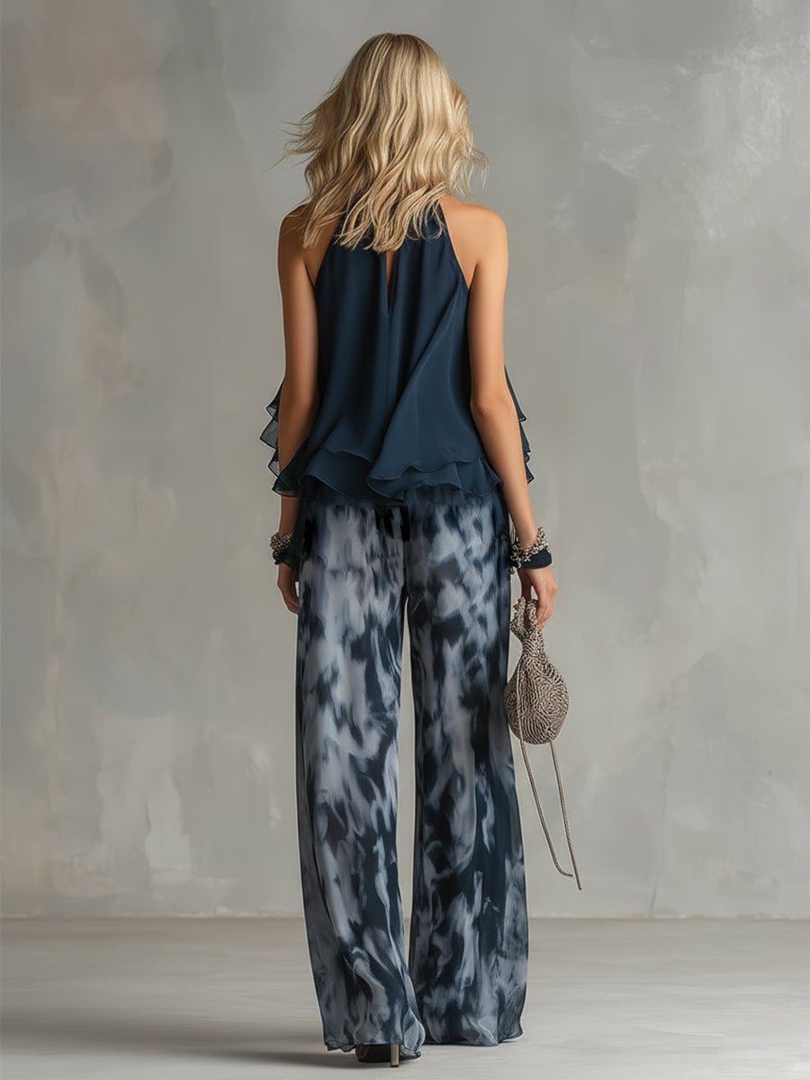 Elegant women's halter neck top and wide leg pants set, ideal for vacation wear and summer fashion.