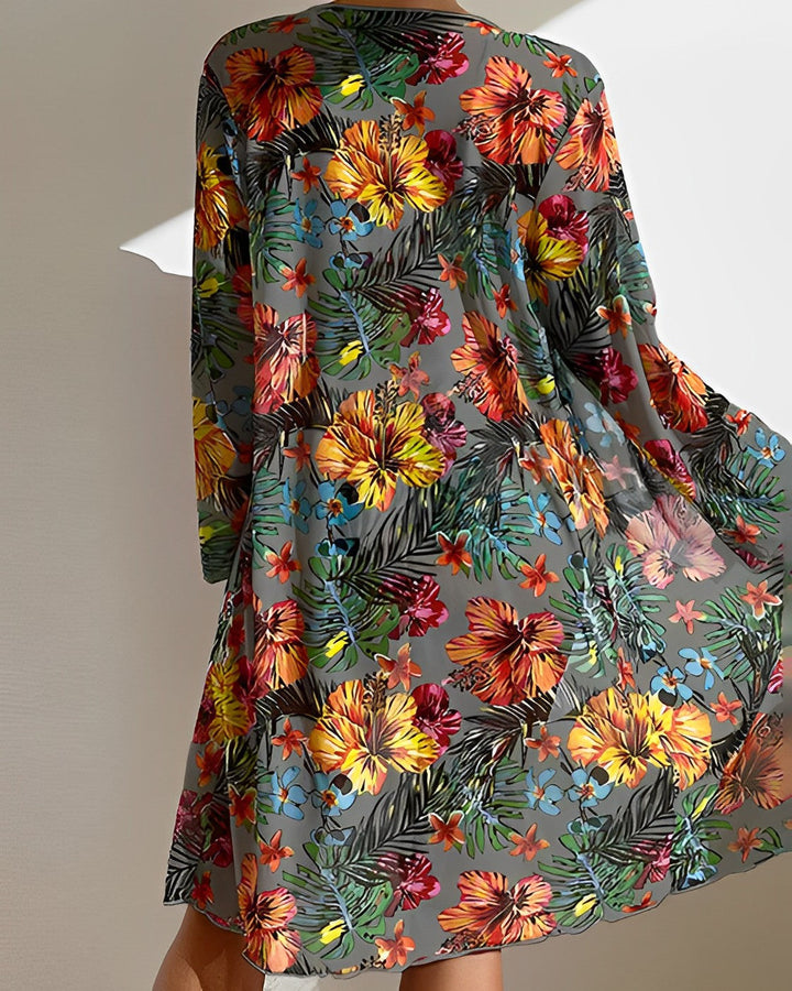 Stylish women's tropical print bikini top and bottom, vibrant floral design for summer swimwear and resort.