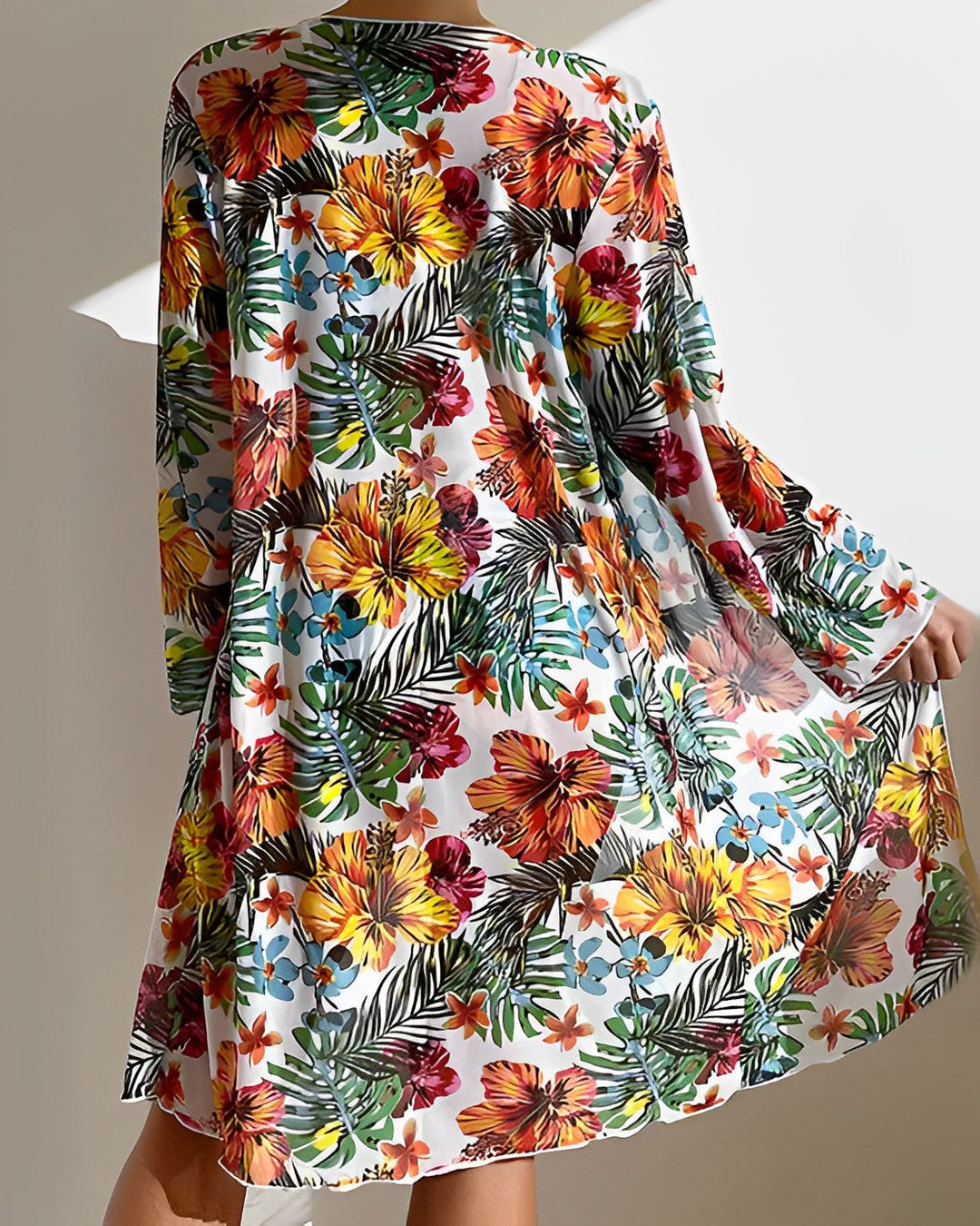 Complete women's tropical print bikini & cover-up set, ideal poolside fashion and summer outfit.