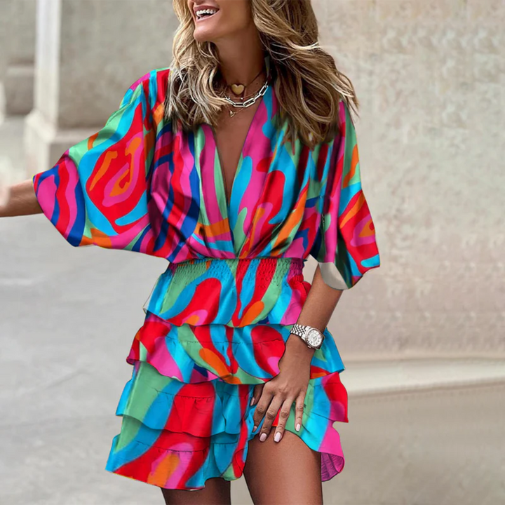 Versatile women's vibrant mini dress, playful chic style for summer casual or party events. Colorful short.