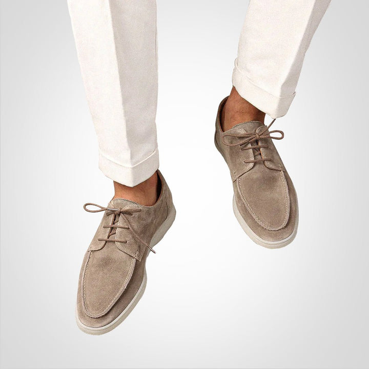 Brown lace-up men's boat shoes, designed for comfort and versatile casual wear during summer.