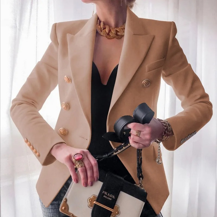 Chic women's vintage double-breasted blazer. Classic jacket for workwear, elegant fashion, or casual occasions.