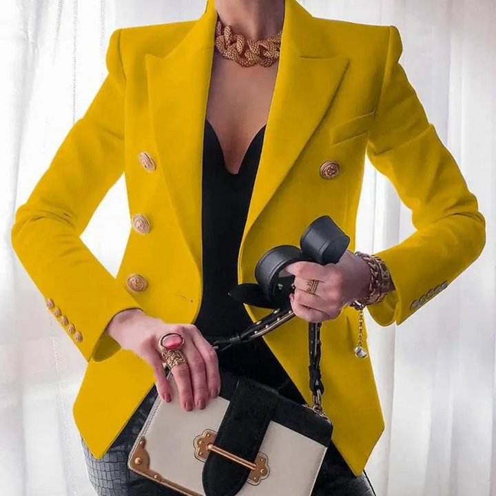 Elegant vintage women's double-breasted blazer. Perfect for formal wear, workwear, or chic casual outfits.