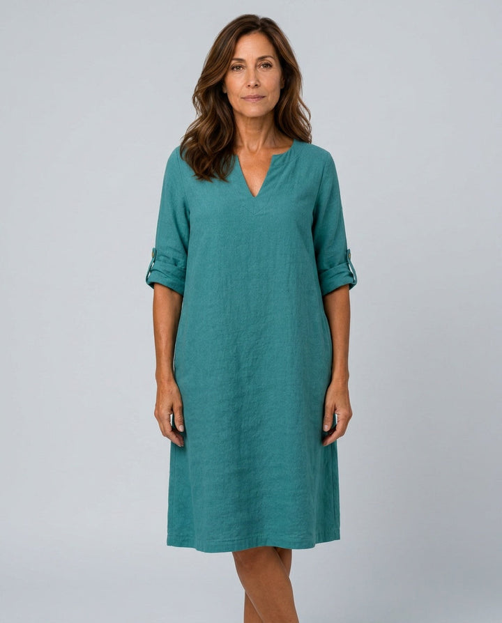 Stylish women's A-line midi dress with V-neck and roll-tab sleeves, offering a comfortable, relaxed fit for summer.