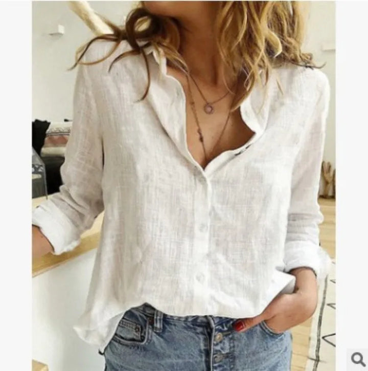 Women's bird print long sleeve blouse, button-up closure. A stylish and comfortable fashion choice.