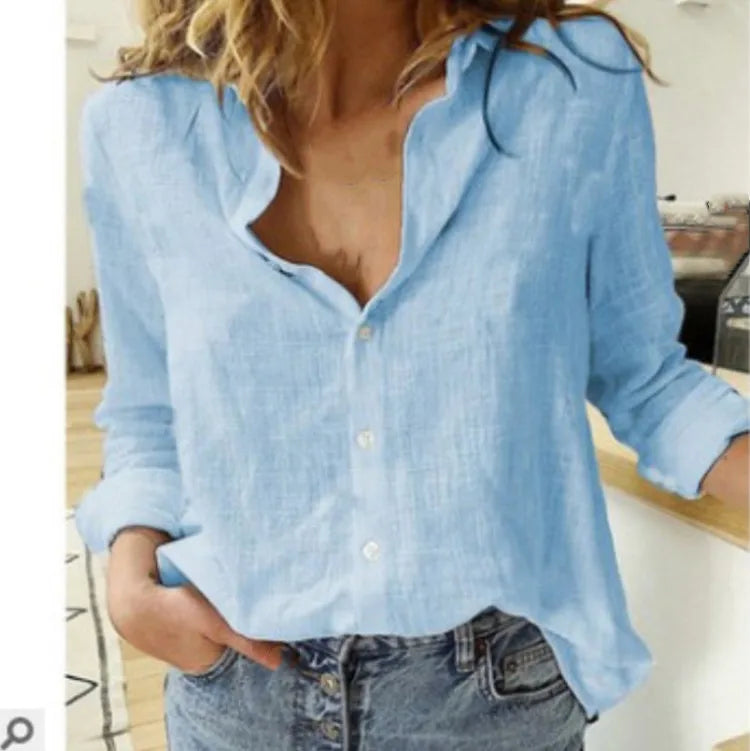 Smart women's button-up blouse, featuring an attractive bird print and long sleeves. Office friendly.